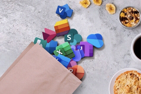 Grocery bag with Microsoft 365 logos spilling out on the countertop.